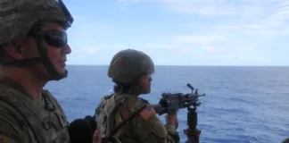 Joint military exercise pits soldiers against fictional enemy, harsh terrain, unseasonable cold