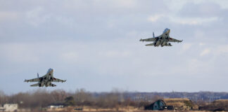 2 Russian pilots killed as warplane crashes into Siberia building during exercise