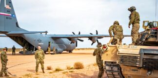 C-130 Simulates Refueling M1 Abrams Tank During Exercise